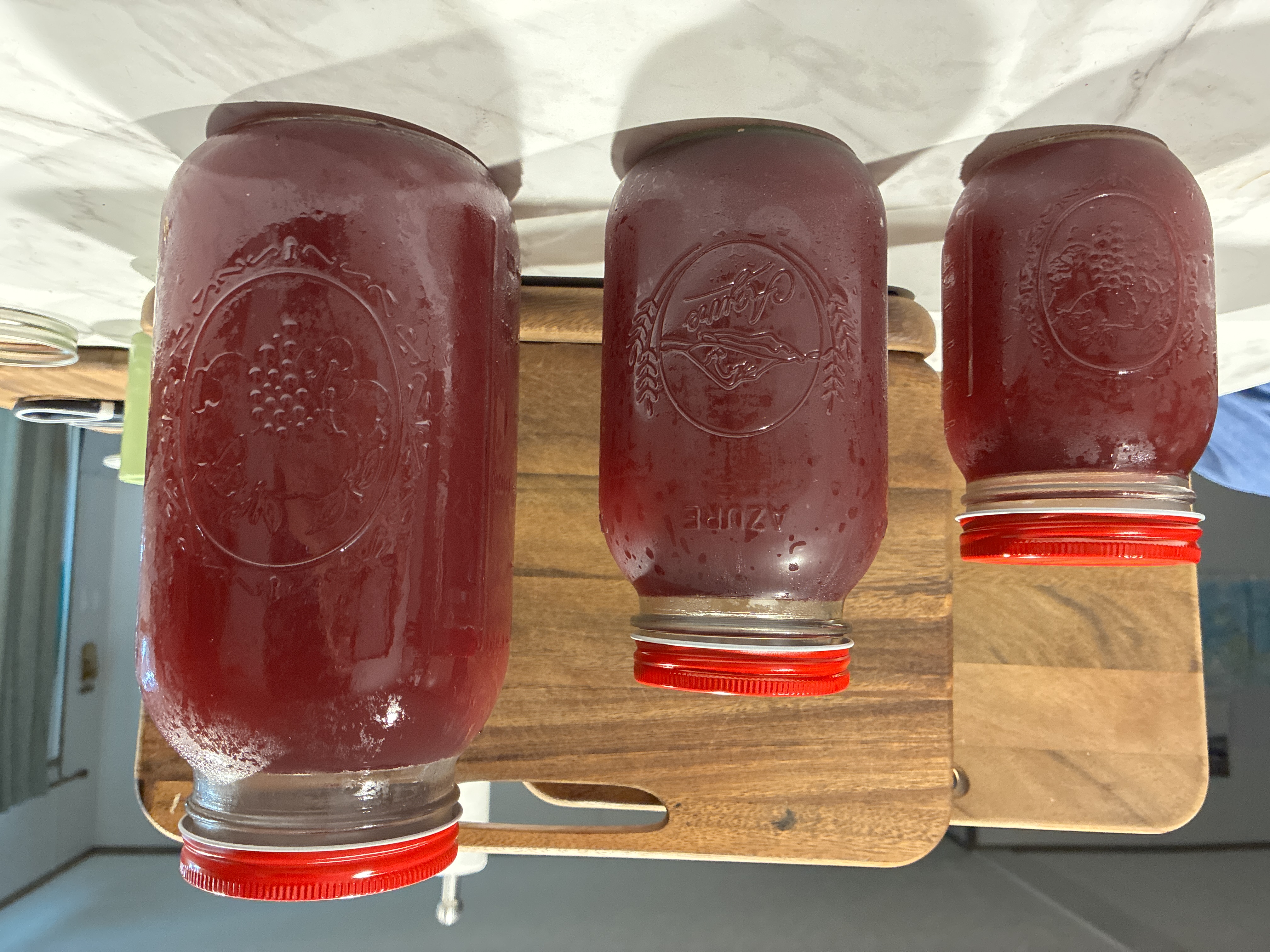 Jars of hibiscus honey herb tea